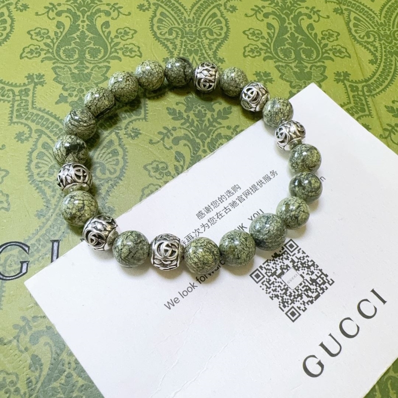 G*u*i bracelets